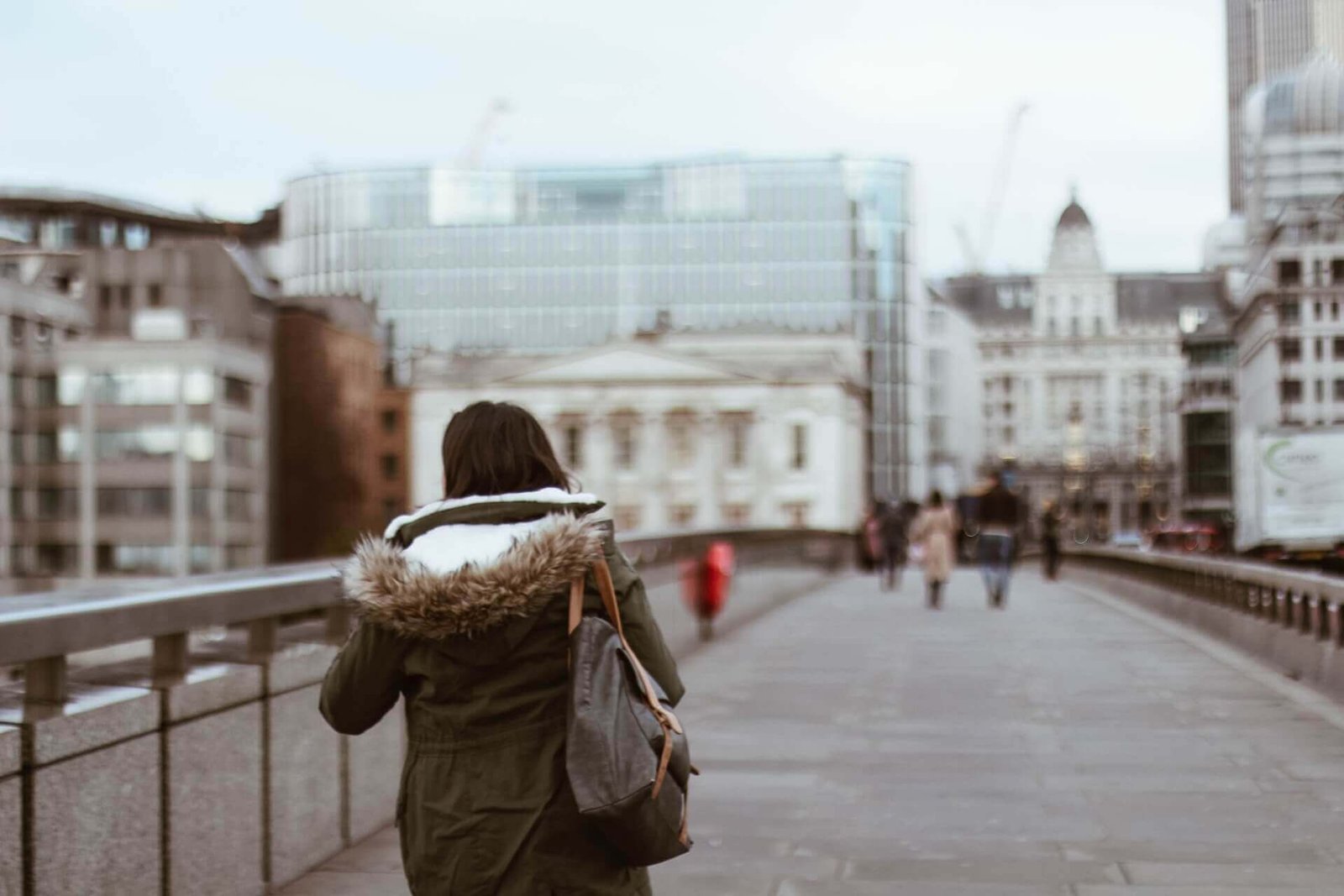 Female standing on a Bridge