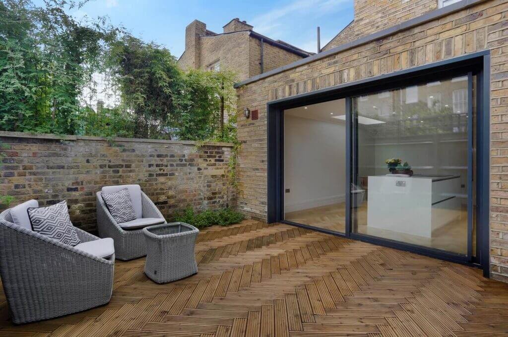 Single storey house extension in Streatham with sliding doors