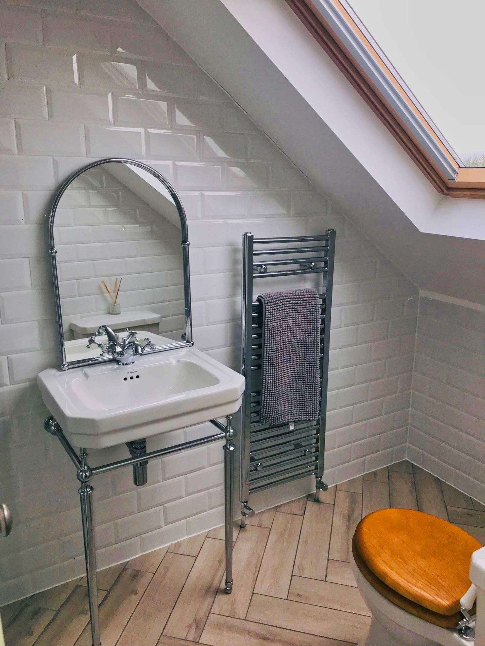 tiny attic bathroom sloped ceiling