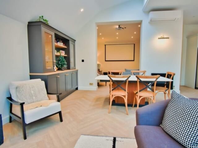 living room with kitchen dresser